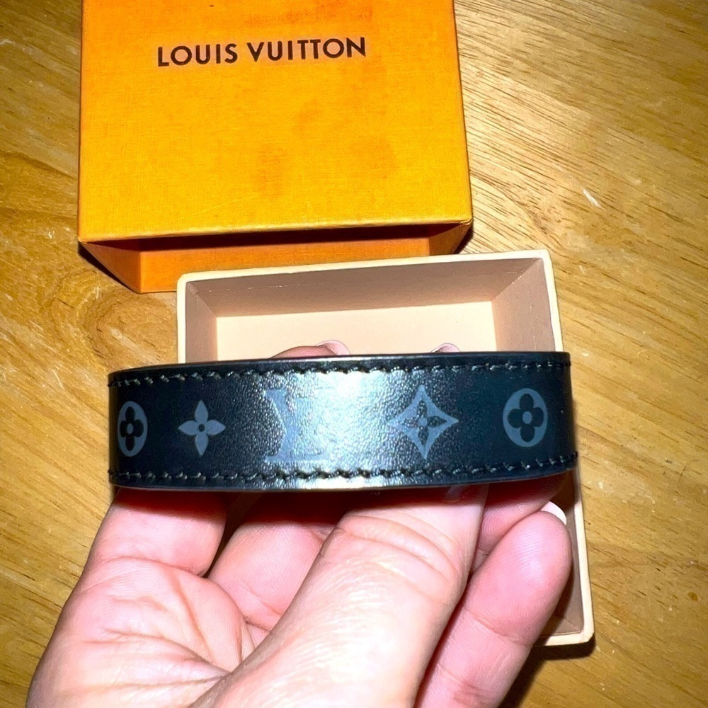Louis Vuitton black adjustable monogram bracelet.